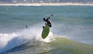 Surfer Jumping